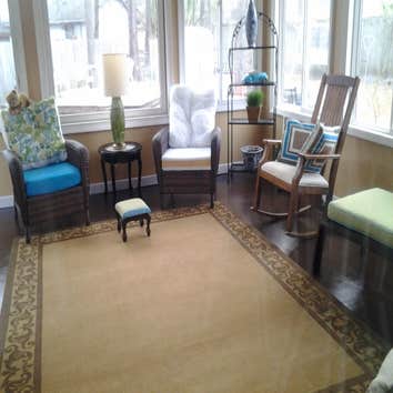 sun room 16x16 concrete slab with 8" lap siding.