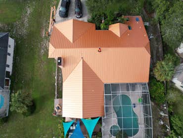 Photos by Steel Hammer Roofing and Construction LLC #25 Shingle to Copper Metal roof. Full roof replacement in Central Florida.