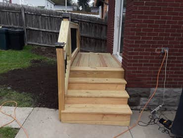 Railings, Concrete Steps, and Back Deck