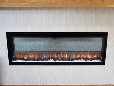 Master bedroom renovation with a gas fireplace