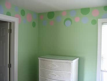 Interior Painting Custom painting in formal dining room, 2-story foyer and formal living room. Custom polka dot boarder in children's room. Drywall Wor