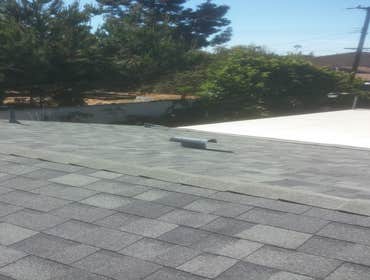 Photo(s) from Revo Roof Company New Installation of Malarkey 30 year dimensional shingles in Huntington Beach Ca.