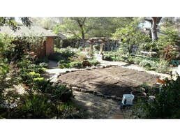 La Crescenta French Intensive Garden 12'x10' garden with rock borders and drip line irrigation system ready for seeding.