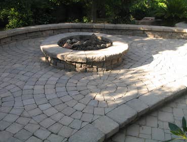 Tech-Noir Landscapes, Inc. Photos This display shows an array of fire pits, water features, and barbeques that add that special touch. Hard scape photo