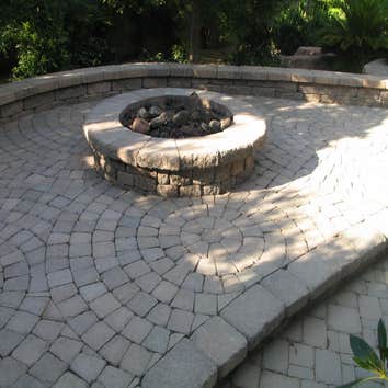 Tech-Noir Landscapes, Inc. Photos This display shows an array of fire pits, water features, and barbeques that add that special touch. Hard scape photo