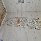 Shower Tile with Glass accents and Niche