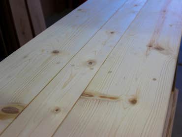 Our Work We take pride in our pieces, whether they are a barn door made of knotty alder wood, or a custom closet that will increase the value of your h