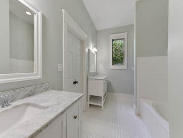 Historic-Style New Construction New construction in Old Mandeville. Home is historic Acadian style with modern floor plan.