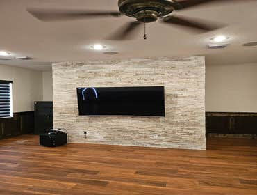 Photos by MMJ Construction Enterprises, LLC #3 Stone wall and Wainscotting