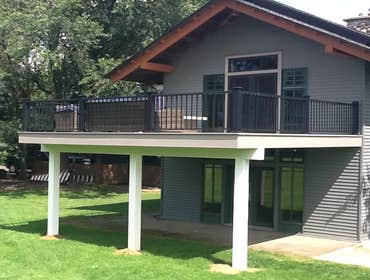 Photos by Custom Home Specialties Inc #2 Timber Tech maintenance free decks with powder coated railings.