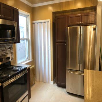 Photos by Fine Tune Remodeling #1 Kitchen remodeling, removed wall separating living room and kitchen to give a open floor plan installed engineered be
