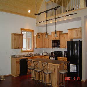 Priest Lake Home This is a cedar home, about 1500sf with a 28 by 12 covered redwood deck. It has vaulted ceilings finished with T&G Spruce.