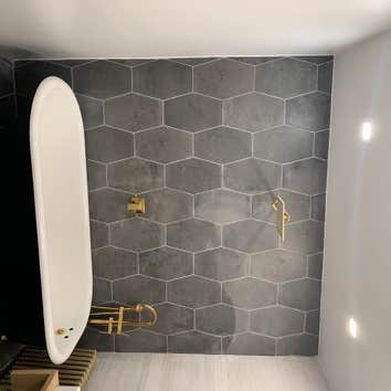 Walk-in bathroom walk-in bathtub With Floating sink , and tank less toilet .