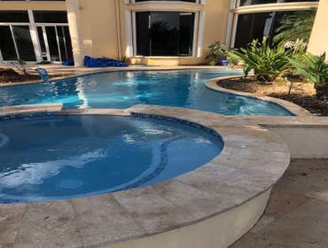Photos by Oasis Pools and Pavers #1