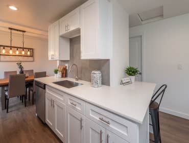 Photos by Artisan Builds Full house remodel. Included new plumbing, electrical, paint, kitchen, bathroom, bedrooms and living space.