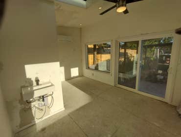 Photos by Stewart & Son Gate & Fence LLC #1 Tiny House with pergola. Small house 17' by 12' small bathroom with pocket door, and small sink with water 