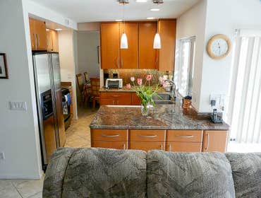 2010: Sleek and Compact Kitchen As you can see in the before photos of this tiny kitchen it was very cramped. It had lots of dead space in corners whic