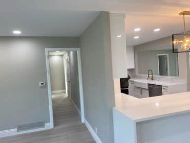Photos by Pan Shi Construction Inc #1 Converted an existing garage into a fully functional Accessory Dwelling Unit (ADU), The project included framing 