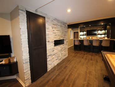 Traditional Finished Basement Novi Traditional and elegant finished basement in Island Lakes of Novi. This basement has a stunning custom walk in wine 