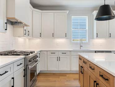 Bright chefs kitchen at 1135 Delmas Ave, East Nashville by CJMC Build: Kitchen with wide aisles.
