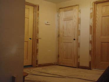 Installation of solid doors.