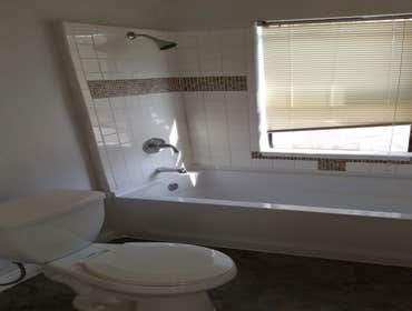 New tub, shower valve, wall ti