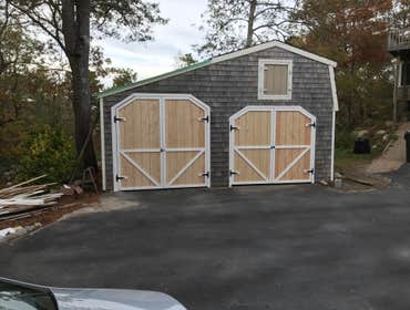 shed doors Replaced two shed doors out of T111 and azek trim boards