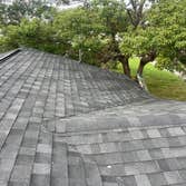 Photos by Heritage Construction Services LLC #1 Tear off existing shingles. Repair all rotten wood. Installed all new underlayment, architectural shing