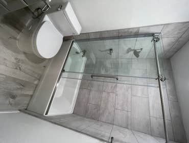 Photos by Creative Construction 360 Inc. #1 Bathroom Remodel Before and After