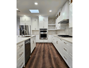 MANDARINO Custom Cabinets in all house, Full backsplash in tile (Accent design), countertops, Custom Fireplace and flooring of lvp.