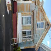 East Gloucester Lead Job The front of the house looked terrible. The house was built in the 1860s and it had layers and layers of paint on it, much of 