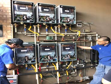 Photos by Tank Yanker plumbing #1 Rebuild hot water system and install new units plus recir systems for whole 3 story building