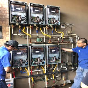 Photos by Tank Yanker plumbing #1 Rebuild hot water system and install new units plus recir systems for whole 3 story building