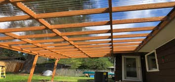 Photos by Dudley Const & Remodel LLC #1 Snow collapsed old awning on the back porch. Built brand new awning with clear, corrugated, plastic and new gut