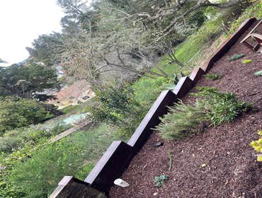 Wooden retaining wall.