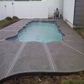 Installation of concrete Patios around of In-ground swimming Pools. Pools Patios which can be: Regular, Creative Stamp Designs, Kool Deck, Color-Dye Co