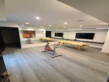 Entertainment areas Hollywood Home Transformed a room into a gym and built a theatre in the basement