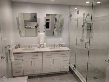 Master bathroom laundry combo Full master bathroom remodel
Featuring:
J & K Cabinetry - White shaker
Custom laundry area
Large two person shower 