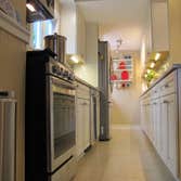 Frey Diamond cabinetry painted in a Coconut finish, countertops by others
