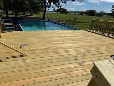 Photos by Fjm Remodeling #1 Above pool 16x16 deck