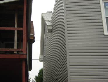 Swank Home Makeover A 2.5 story, single-family home: Siding, windows, insullation, soffit, fascia, capping. Also, repaired fence damage, installed new