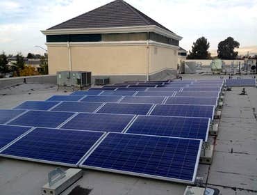 Installations Green Stock Solar ground-mounts and installations on comp, tile, and metal roofs!