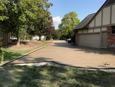exposed aggregate Driveway Photo by Potoroka Concrete Macomb MI