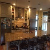 Kitchen Completely gutted two rooms, designed and built this large kitchen. From gutting to the painting.
