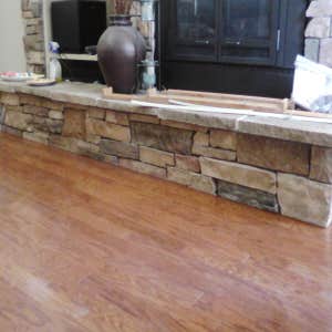 Undercut stone fire place