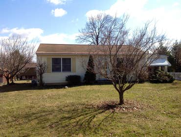 Project photos from Griesemer Construction The exterior of this porch was old deteriorated concrete with a aluminum posts & roof.Now it's trex lumber d