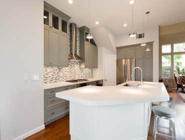 Photos by Visionary Home Remodeling #1 Gray & White Kitchen
Open concept kitchen with two colors cabinet provide a contemporary kitchen.
white quartz c