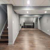 Photos by Buck Construction #3 Full basement renovation with bar and bathroom