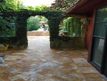 Travertine Paradise in Coconut Grove Patio, Courtyard, Pond, Pool Deck, and Pool redesign by Shosh vant Verlaat, Hardscape Designer, and installed by D
