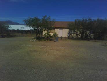 Thompson Pro Landscaping Project Simple clean up in Benson A.Z. It started as a one or two day clean up.From there stucco patch's on the house and demo